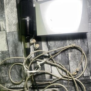 Audio Technica Black Microphone with Silver Accessory